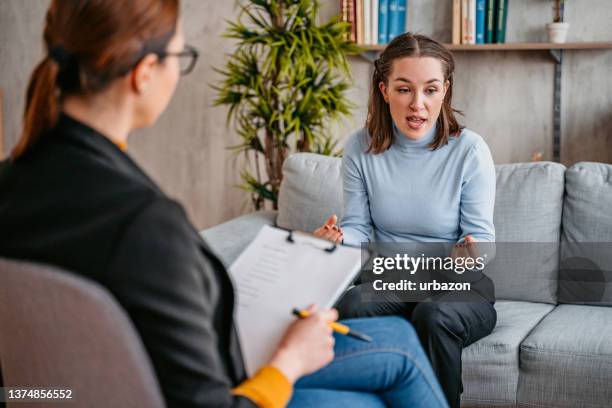 young woman going to therapy - private information stock pictures, royalty-free photos & images