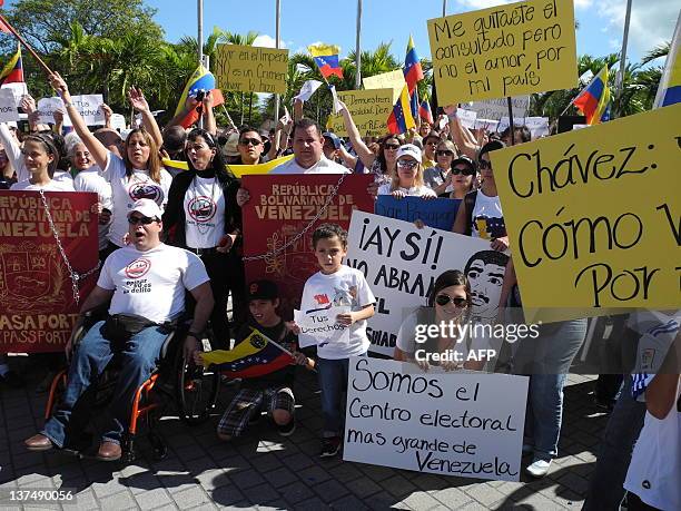 Venezuelan citizens protest in the Torch of Friendship, in Miami, Florida on January 21, 2012 against the closure of the Venezuelan consulate in...