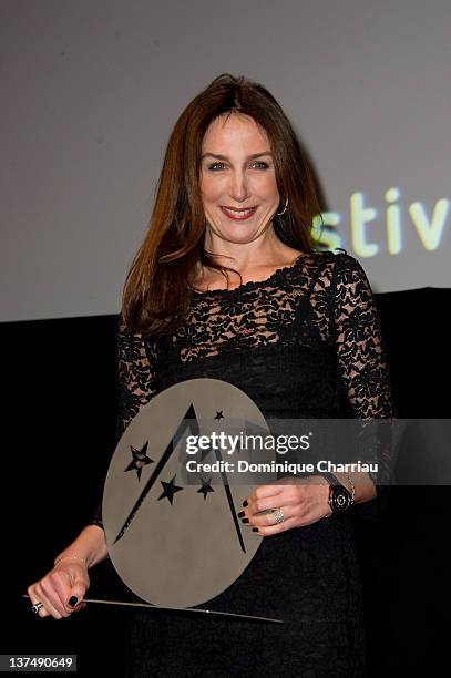 French actress Elsa Zylberstein receives the Award for Best Actress during the Closing Ceremony of the 15th L'Alpe D'Huez International Comedy Film...