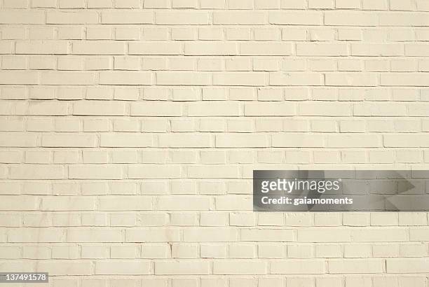 creamy brick wall - beige brick stock pictures, royalty-free photos & images