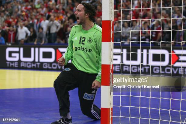 Silvio Heinevetter of Germany shows emotions after saving a shot during the Men's European Handball Championship second round group one match between...
