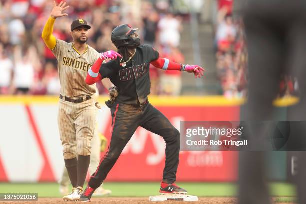 Elly De La Cruz of the Cincinnati Reds reacts after hitting a double in the eleventh inning during the game between the San Diego Padres and the...