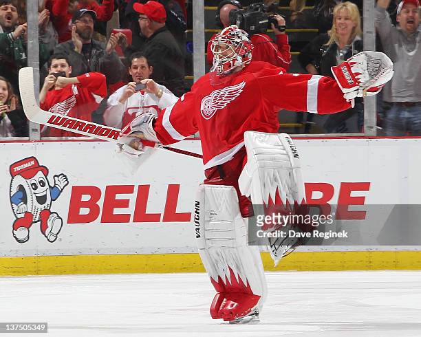 Jimmy Howard of the Detroit Red Wings celebrates his shootout win after an NHL game against the Columbus Blue Jackets at Joe Louis Arena on January...
