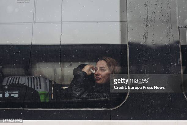 Woman cries on an evacuation train leaving Kiev, March 1 in Kiev, Ukraine. Ukrainian authorities have reported dozens of deaths in a shell attack by...