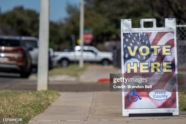 Vote Here' sign is displayed near a polling station on March 01, 2022 in Laredo, Texas. Texans are headed to the polls to vote in the state's first...