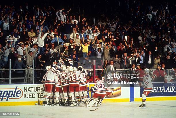 The New York Rangers celebrate after Stephane Matteau scored the winning goal in the second overtime of Game 7 of the 1994 Eastern Conference Finals...