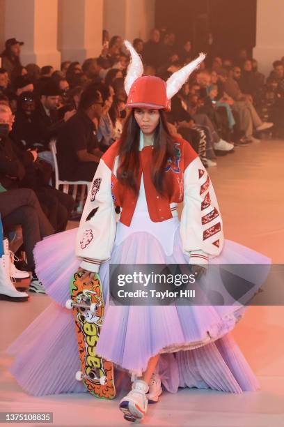 Ama Lou walks the runway during the Off-White Womenswear Fall/Winter 2022-2023 show Spaceship Earth: An "Imaginary Experience" at Palais Brongniart...