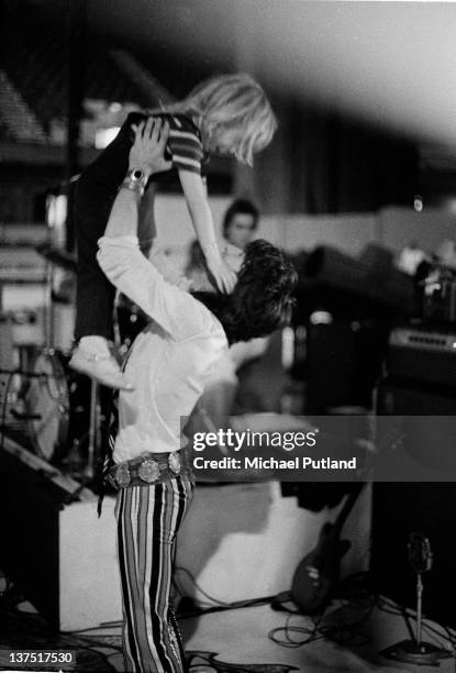 7th SEPTEMBER: Keith Richards of the Rolling Stones holds his son Marlon in the air above him during a soundcheck at Wembley Empire Pool, London, 7th...