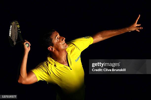 Nicolas Almargo of Spain serves in his fourth round match against Tomas Berdych of Germany during day seven of the 2012 Australian Open at Melbourne...