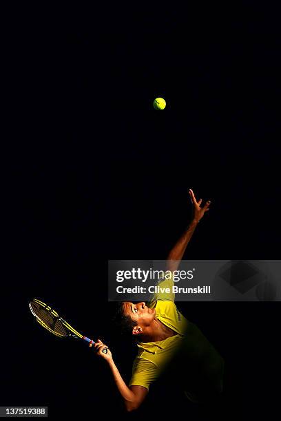 Nicolas Almargo of Spain serves in his fourth round match against Tomas Berdych of Germany during day seven of the 2012 Australian Open at Melbourne...