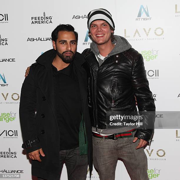 Manager Ash Pournouri and DJ/producer Avicii attend their Feeding America benefit at LAVO on January 21, 2012 in New York City.