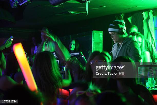 Avicii performs a benefit for Feeding America at LAVO on January 21, 2012 in New York City.