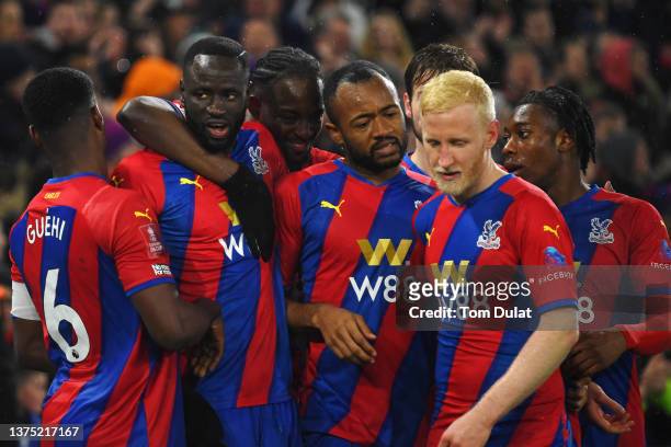 Cheikhou Kouyate of Crystal Palace celebrates their sides first goal with team mates during the Emirates FA Cup Fifth Round match between Crystal...