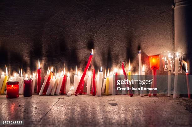 Candles on the site of Anna Borsa's femicide on March 01, 2022 in Pontecagnano Faiano, Italy. Anna Borsa was killed in the beauty salon where she...