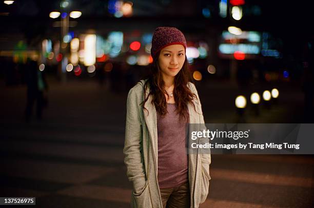 Girl at crossroad at night