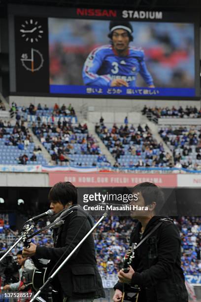 Japanese singer YUZU,Yujin Kitagawa and Koji Iwasawa sing for Naoki Matsuda during Naoki Matsuda Memorial Game at Nissan Stadium on January 22, 2012...