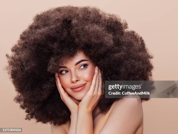 beautiful woman with afro hairstyle - afro wig stock pictures, royalty-free photos & images