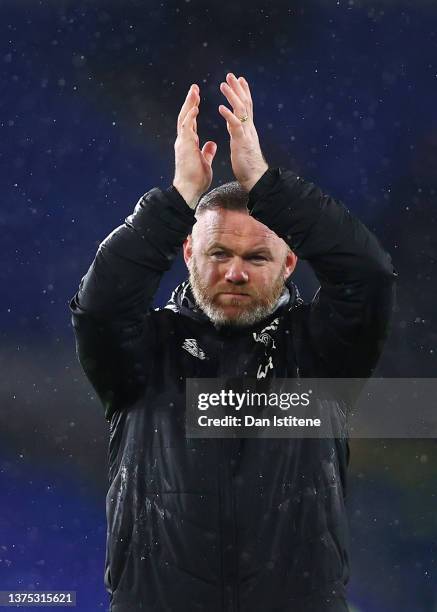 Wayne Rooney, manager of Derby County applauds the fans after the Sky Bet Championship match between Cardiff City and Derby County at Cardiff City...
