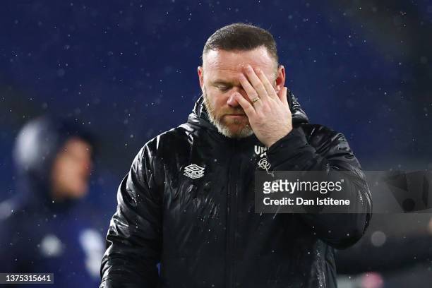 Wayne Rooney, manager of Derby County react after the Sky Bet Championship match between Cardiff City and Derby County at Cardiff City Stadium on...