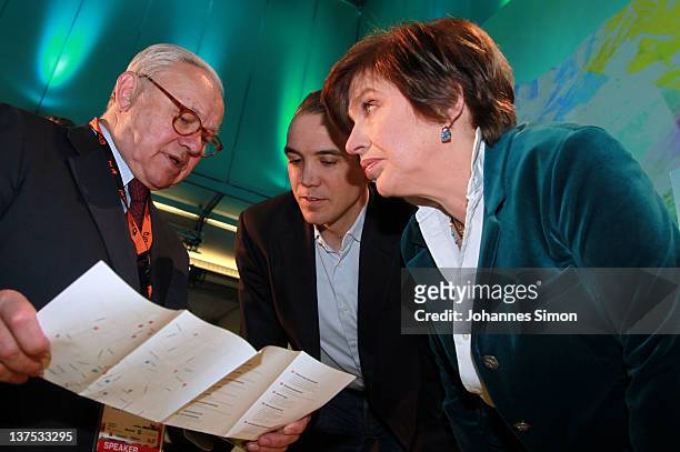 Founder Steffi Czerny and Marcel Reichart speak with DLD chairman Hubert Burda during the opening ceremony of the Digital Life Design conference at...
