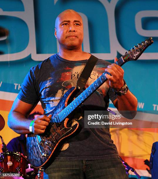 Baseball great Bernie Williams performs on stage with Band From TV at the 110th NAMM Show - Day 3 at the Anaheim Convention Center on January 21,...