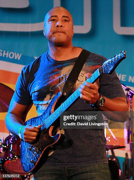 Baseball great Bernie Williams performs on stage with Band From TV at the 110th NAMM Show - Day 3 at the Anaheim Convention Center on January 21,...