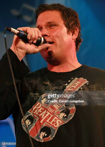Personality Bob Guiney performs on stage with Band From TV at the 110th NAMM Show - Day 3 at the Anaheim Convention Center on January 21, 2012 in...