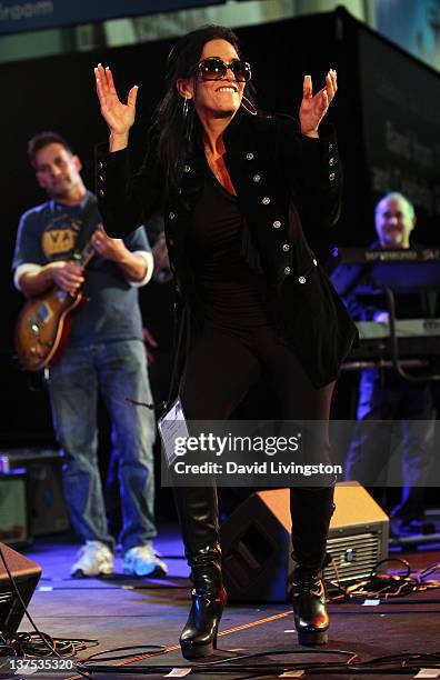 Drummer Sheila E. Performs on stage with Band From TV at the 110th NAMM Show - Day 3 at the Anaheim Convention Center on January 21, 2012 in Anaheim,...