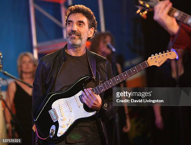 Producer Chuck Lorre performs on stage with Band From TV at the 110th NAMM Show - Day 3 at the Anaheim Convention Center on January 21, 2012 in...