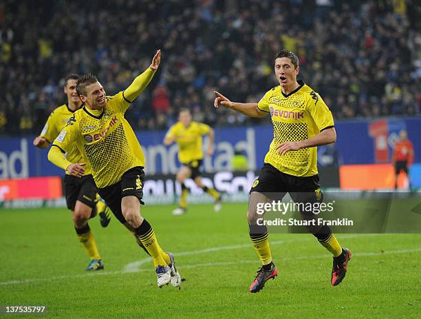 Robert Lewandowski of Dortmund celebrates his goal during the Bundesliga match between Hamburger SV and Borussia Dortmund at Imtech Arena on January...