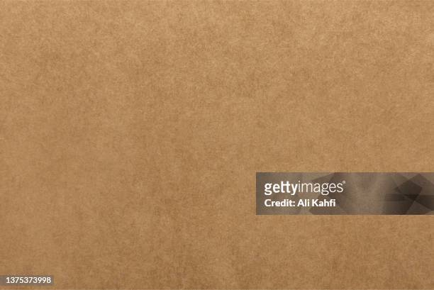 braunem papier textur hintergrund - brown paper stock-grafiken, -clipart, -cartoons und -symbole