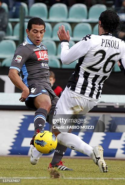 Napoli's Walter Gargano of Uruguay vies for the ball with Sienna's Emanuele Pesoli during their serie A football match at Artemio Franchi stadium in...