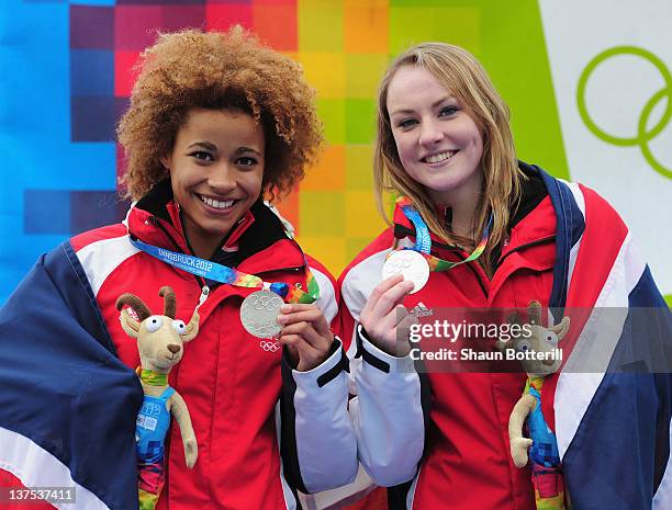 Mica McNeill and Jazmin Sawyers of Great Britain celebrate after winning the silver medal in the Two-Woman Bobsleigh event at the Olympic Sliding...