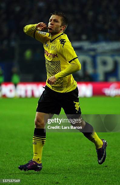 Jakub Blaszczykowski of Dortmund celebrates after scoring his teams third goal during the Bundesliga match between Hamburger SV and Borussia Dortmund...