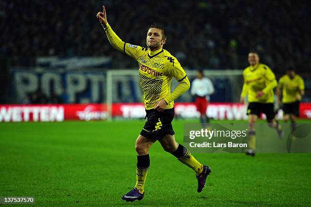 Jakub Blaszczykowski of Dortmund celebrates after scoring his teams third goal during the Bundesliga match between Hamburger SV and Borussia Dortmund...
