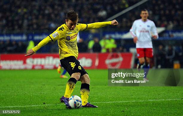 Jakub Blaszczykowski of Dortmund scores his teams third goal during the Bundesliga match between Hamburger SV and Borussia Dortmund at Imtech Arena...