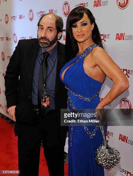 Comedian and show host Dave Attell and adult film actress Lisa Ann arrive at the 29th annual Adult Video News Awards Show at the Hard Rock Hotel &...