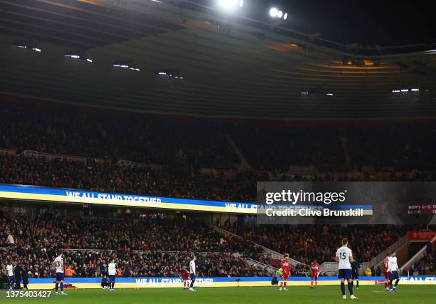 The LED screen inside the stadium shows a Ukrainian flag to indicate peace and sympathy with Ukraine during the Emirates FA Cup Fifth Round match...