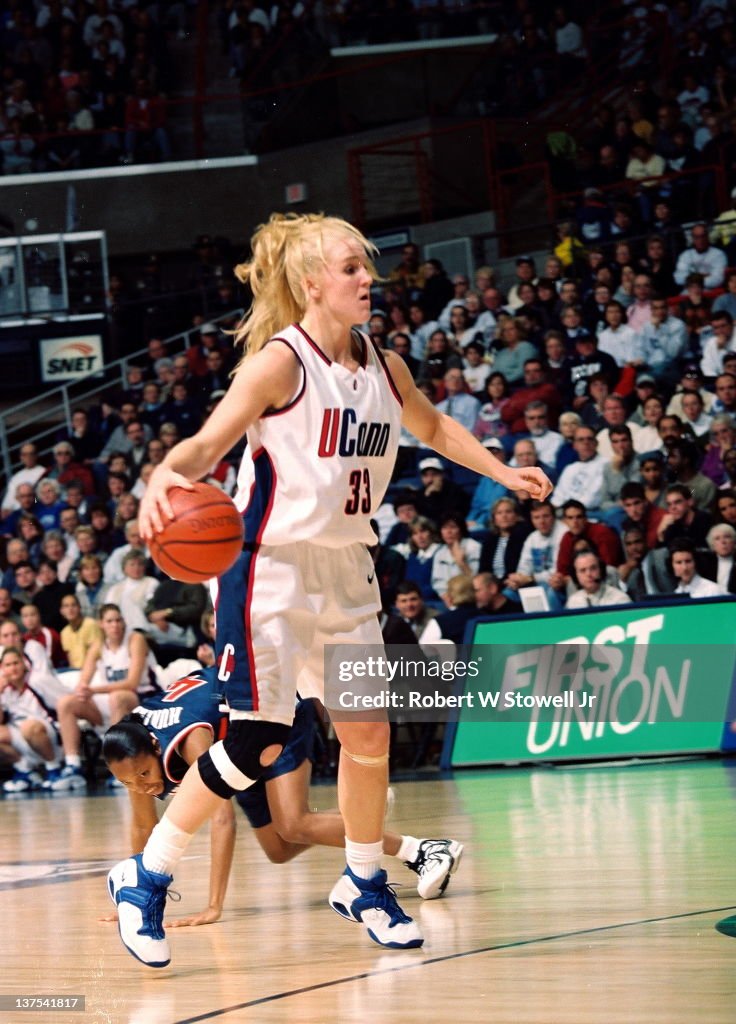 University of Connecticut's Shea Ralph controls the ball while... News ...