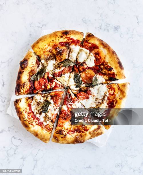 margherita pizza on white background - pizza from above stock pictures, royalty-free photos & images
