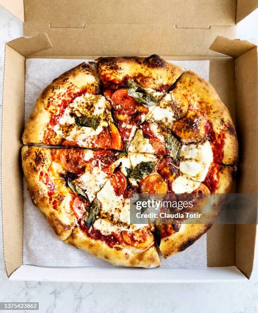 margherita pizza in a box on white background - margharita pizza stock pictures, royalty-free photos & images