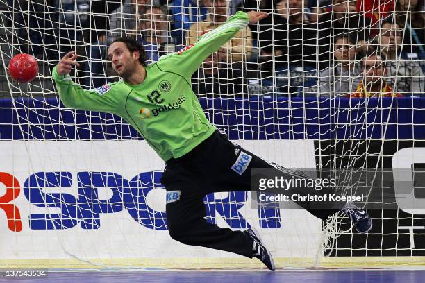 Silvio Heinevetter of Germany gets a goal during the Men's European Handball Championship second round group one match between Serbia anhd Germany at...