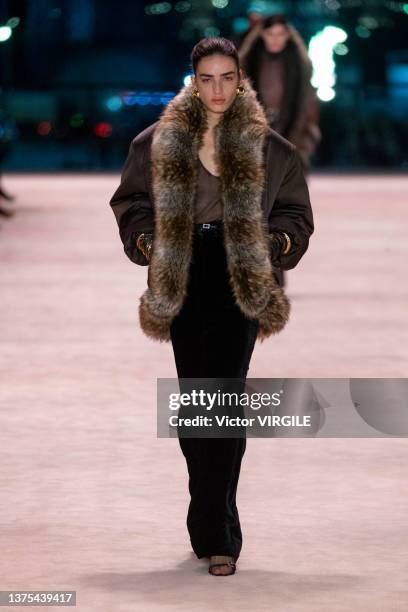 Model walks the runway during the Saint Laurent Ready to Wear Fall/Winter 2022-2023 fashion show as part of the Paris Fashion Week on March 1, 2022...