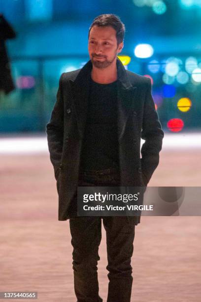 Fashion designer Anthony Vaccarello walks the runway during the Saint Laurent Ready to Wear Fall/Winter 2022-2023 fashion show as part of the Paris...