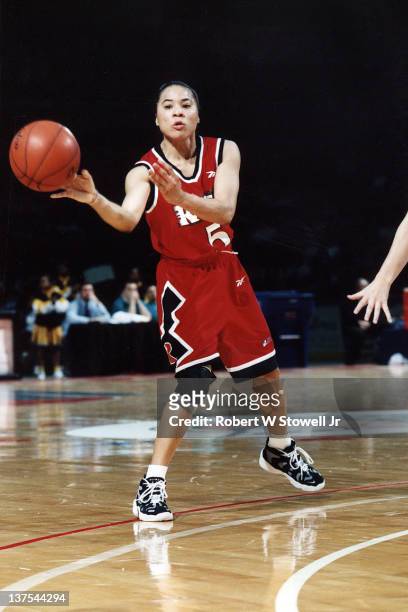 Dawn Staley, point guard for the Philadelphia Rage women's basketball team of the American Basketball League, dishes the ball against the New England...
