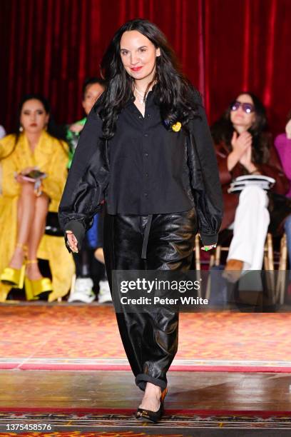 Christelle Kocher walks the runway during the Koche Womenswear Fall/Winter 2022-2023 show as part of Paris Fashion Week on March 01, 2022 in Paris,...