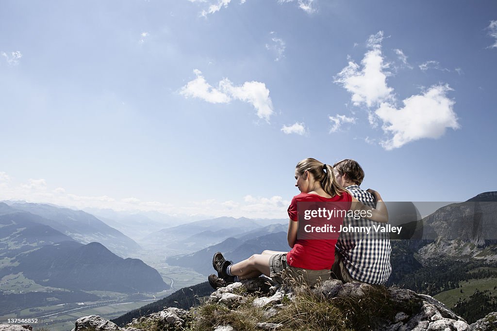 Couple admiring rural landscape