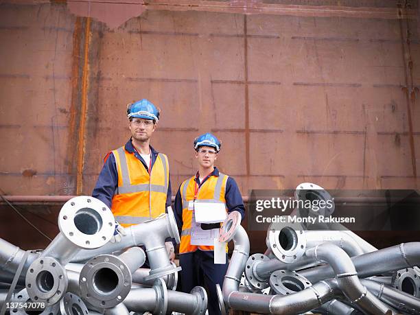 engineers inspecting ship parts - shipbuilder stock pictures, royalty-free photos & images