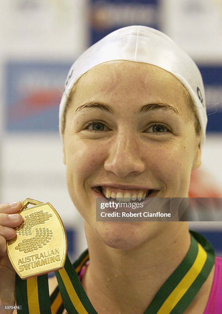 Elka Graham with her gold medal after winning the Womens 100metre Freestyle Final