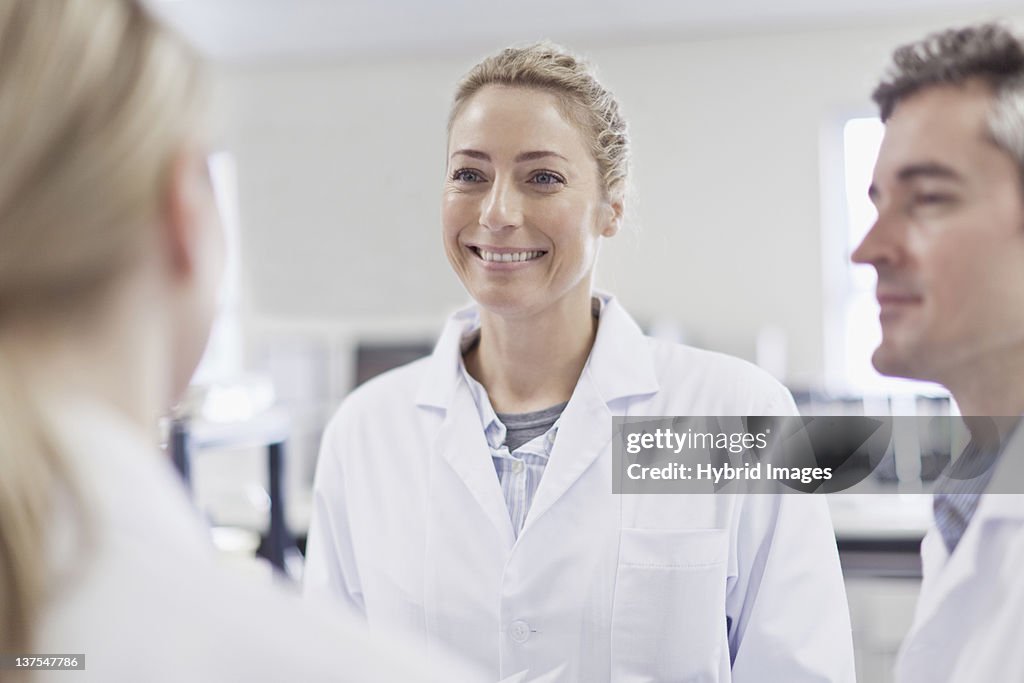 Scientist smiling in pathology lab